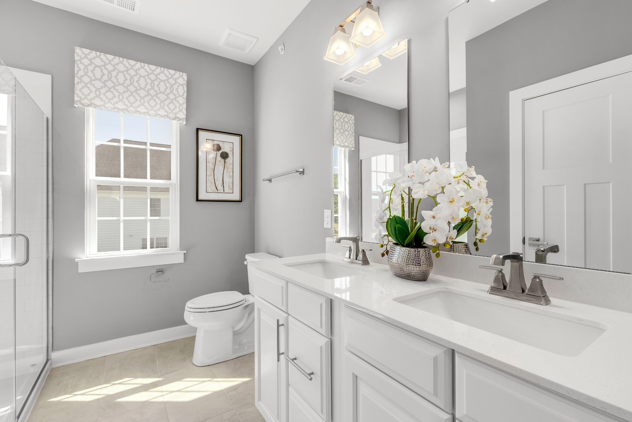 4019 Oglethorpe Drive Franklin, TN 37064 - Photo 20 of 31 a bathroom with a granite countertop sink a toilet and a mirror