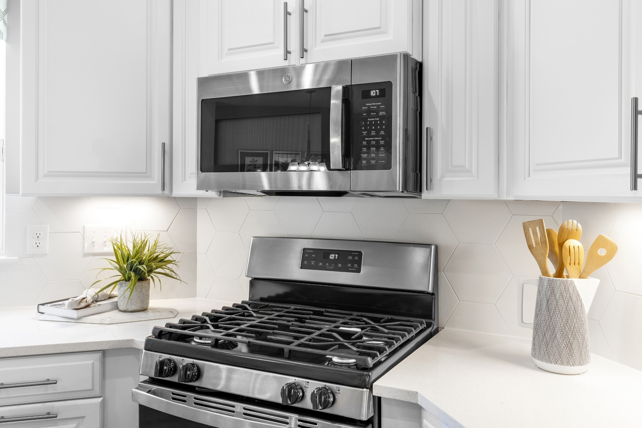 4019 Oglethorpe Drive Franklin, TN 37064 - Photo 29 of 31 a kitchen with a stove and a white cabinets