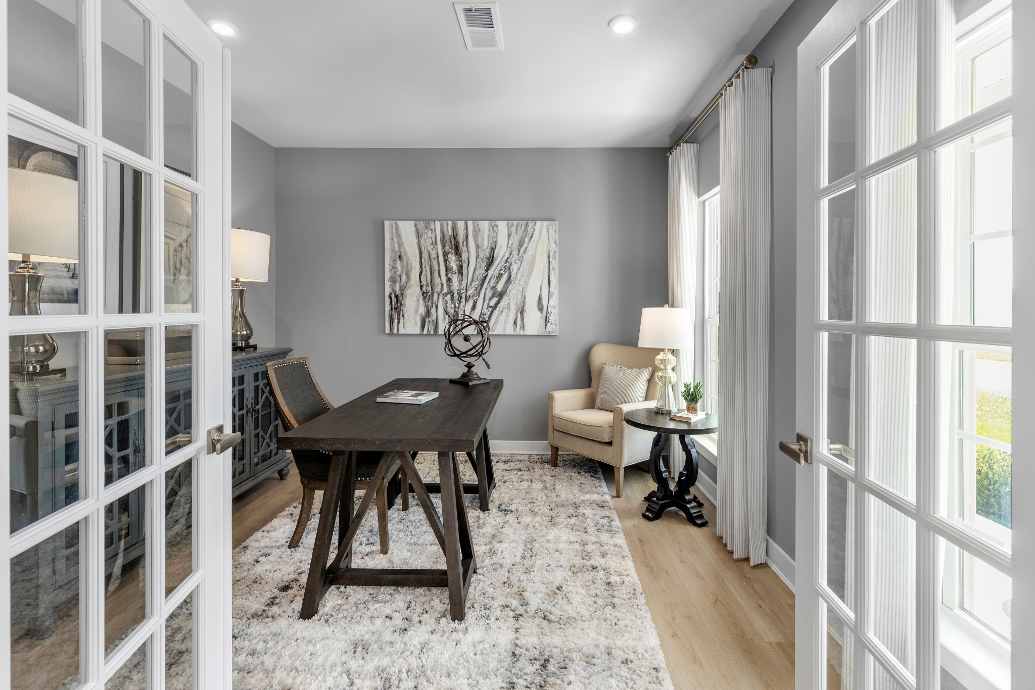 4019 Oglethorpe Drive Franklin, TN 37064 - Photo 30 of 31 a living room with furniture a large window and white walls