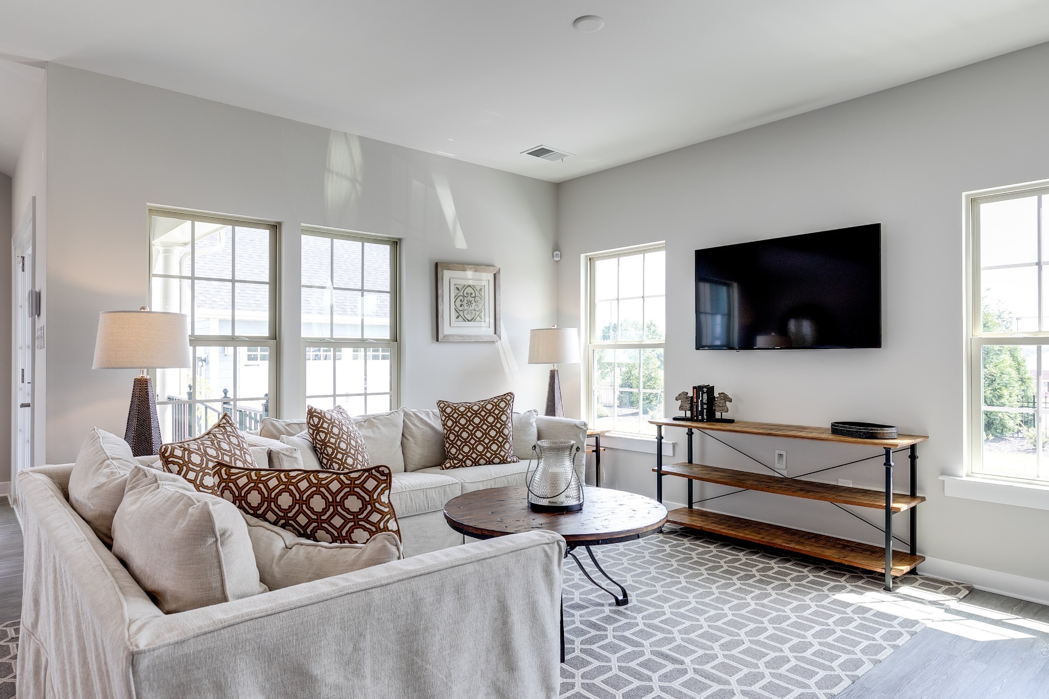 4019 Oglethorpe Drive Franklin, TN 37064 - Photo 7 of 31 a living room with furniture and a flat screen tv