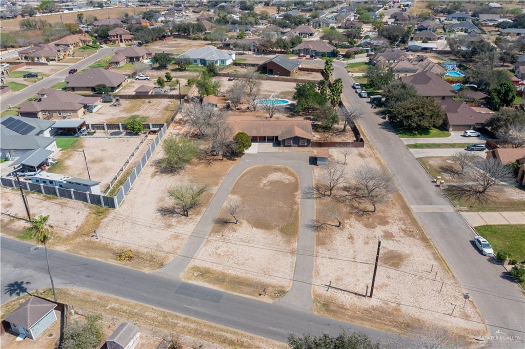 501 South Greene Road Mission, TX 78572 - Photo 26 of 28 an aerial view of residential houses with outdoor space