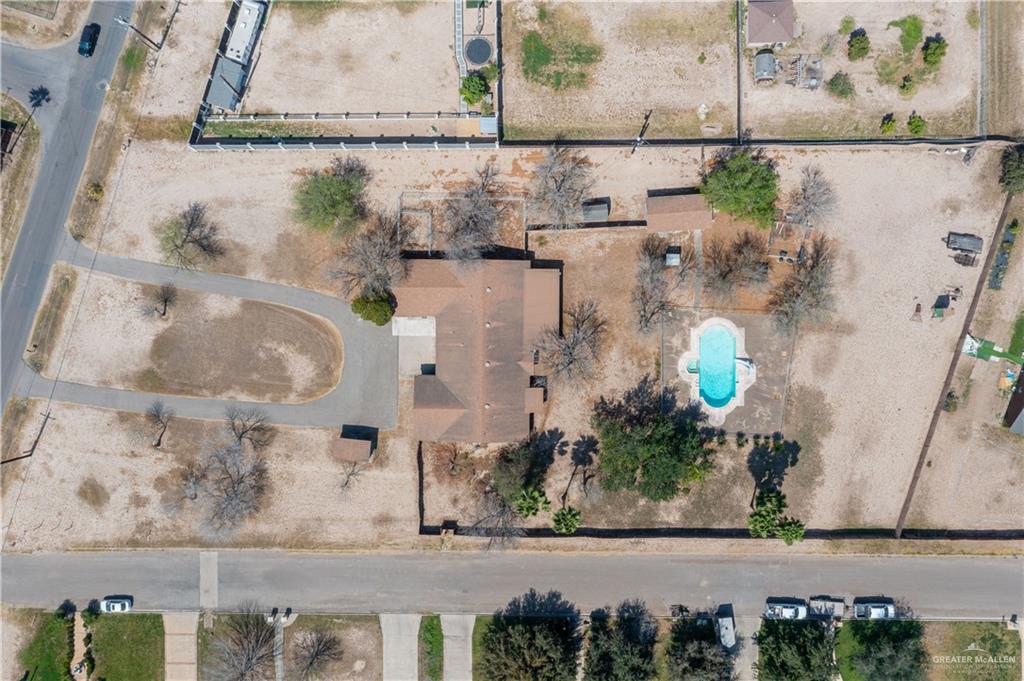 501 South Greene Road Mission, TX 78572 - Photo 27 of 28 a picture of a bathroom with a sink and a mirror