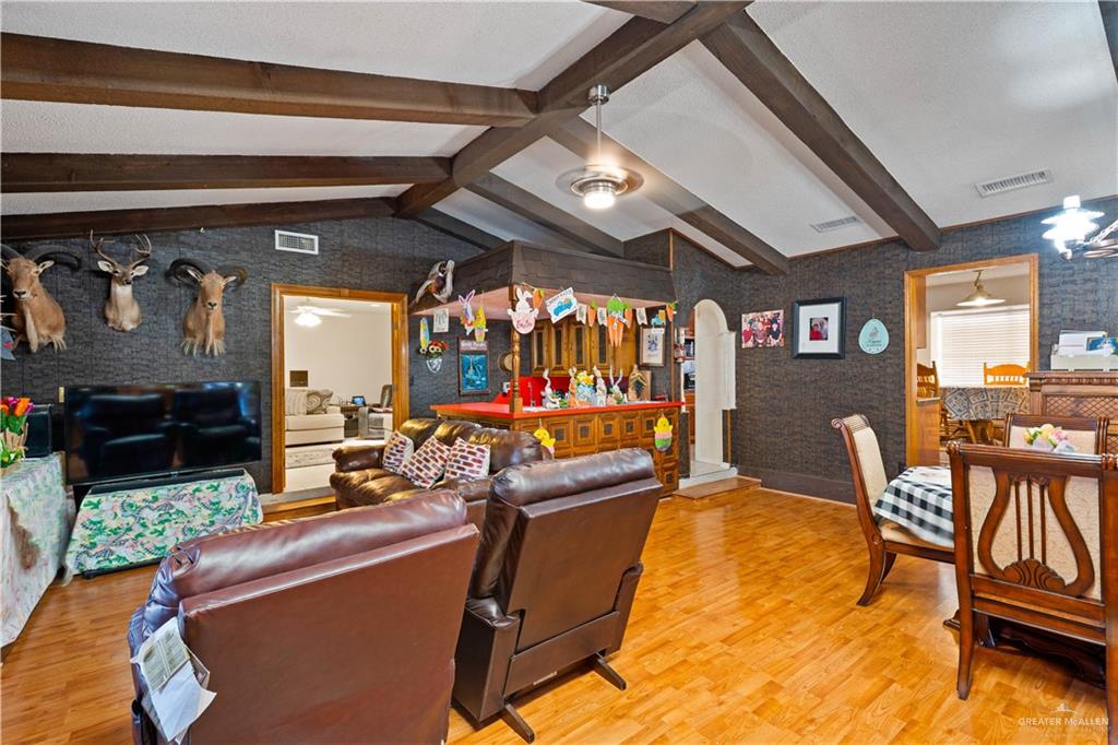 501 South Greene Road Mission, TX 78572 - Photo 5 of 28 a view of a dining room with furniture