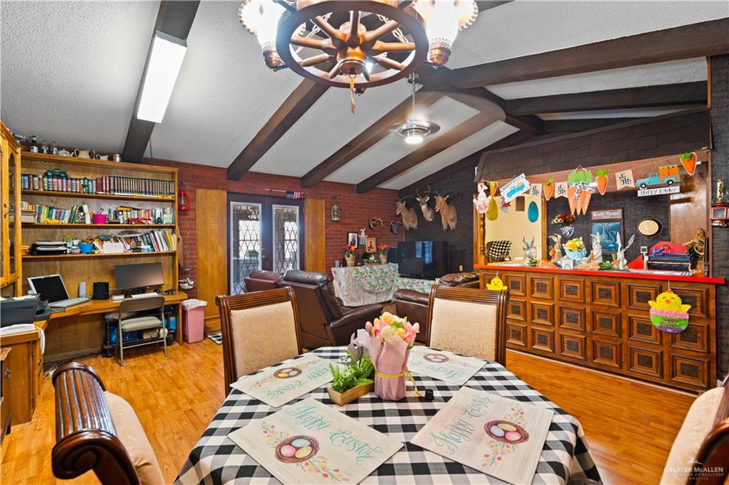 501 South Greene Road Mission, TX 78572 - Photo 6 of 28 a view of a dining room with furniture
