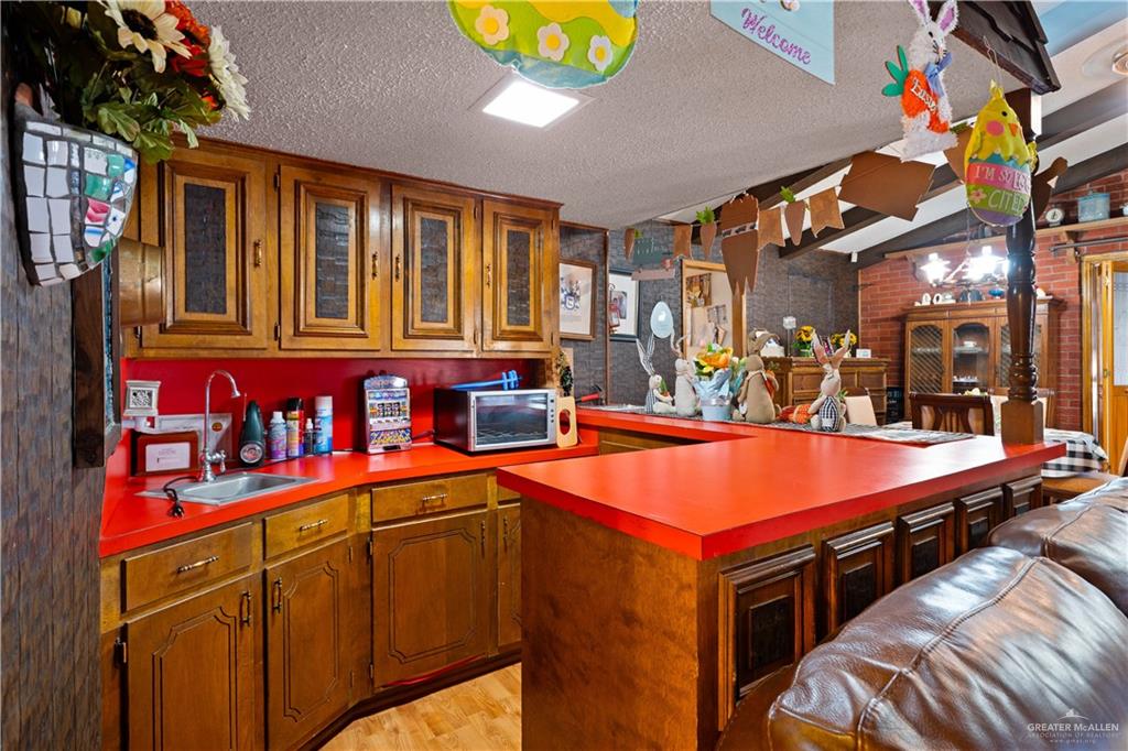 501 South Greene Road Mission, TX 78572 - Photo 7 of 28 a outdoor space with pool and furniture