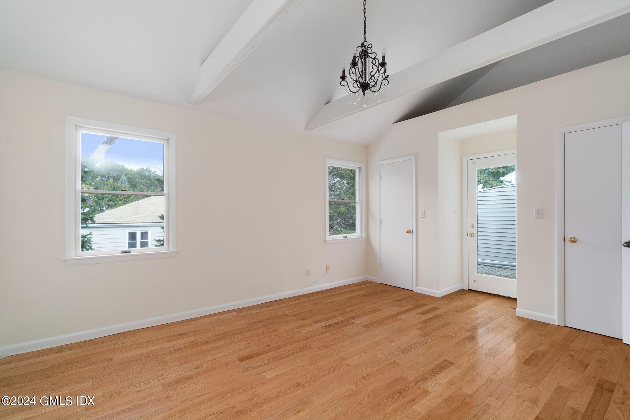 10 Tulip Street, Unit A Cos Cob, CT 06807 - Photo 11 of 27 a view of empty room with wooden floor