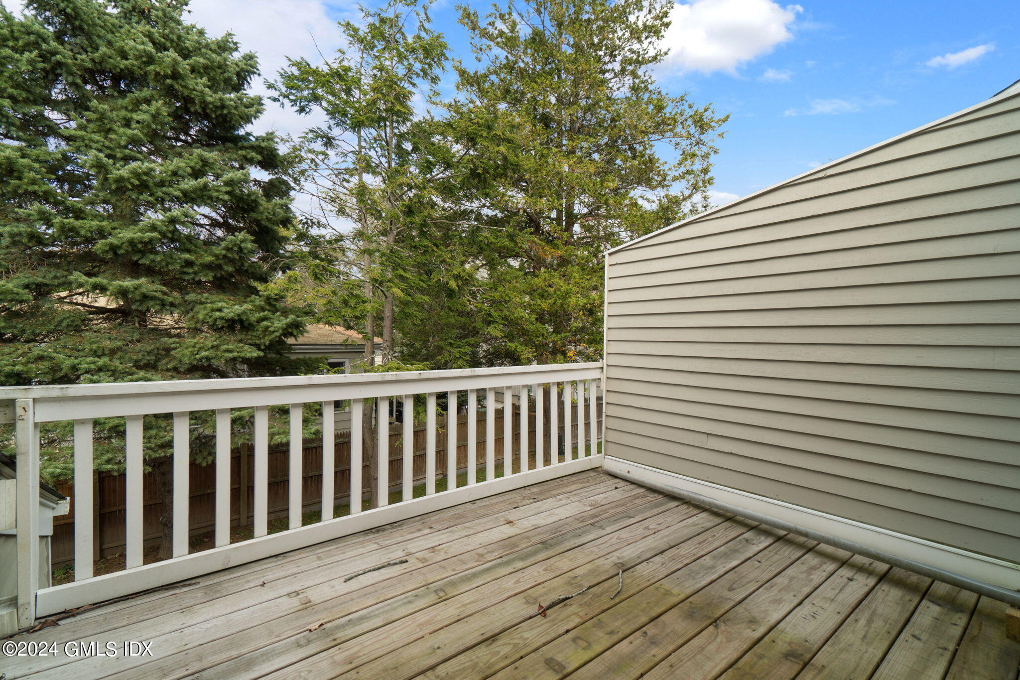 10 Tulip Street, Unit A Cos Cob, CT 06807 - Photo 23 of 27 a view of wooden deck