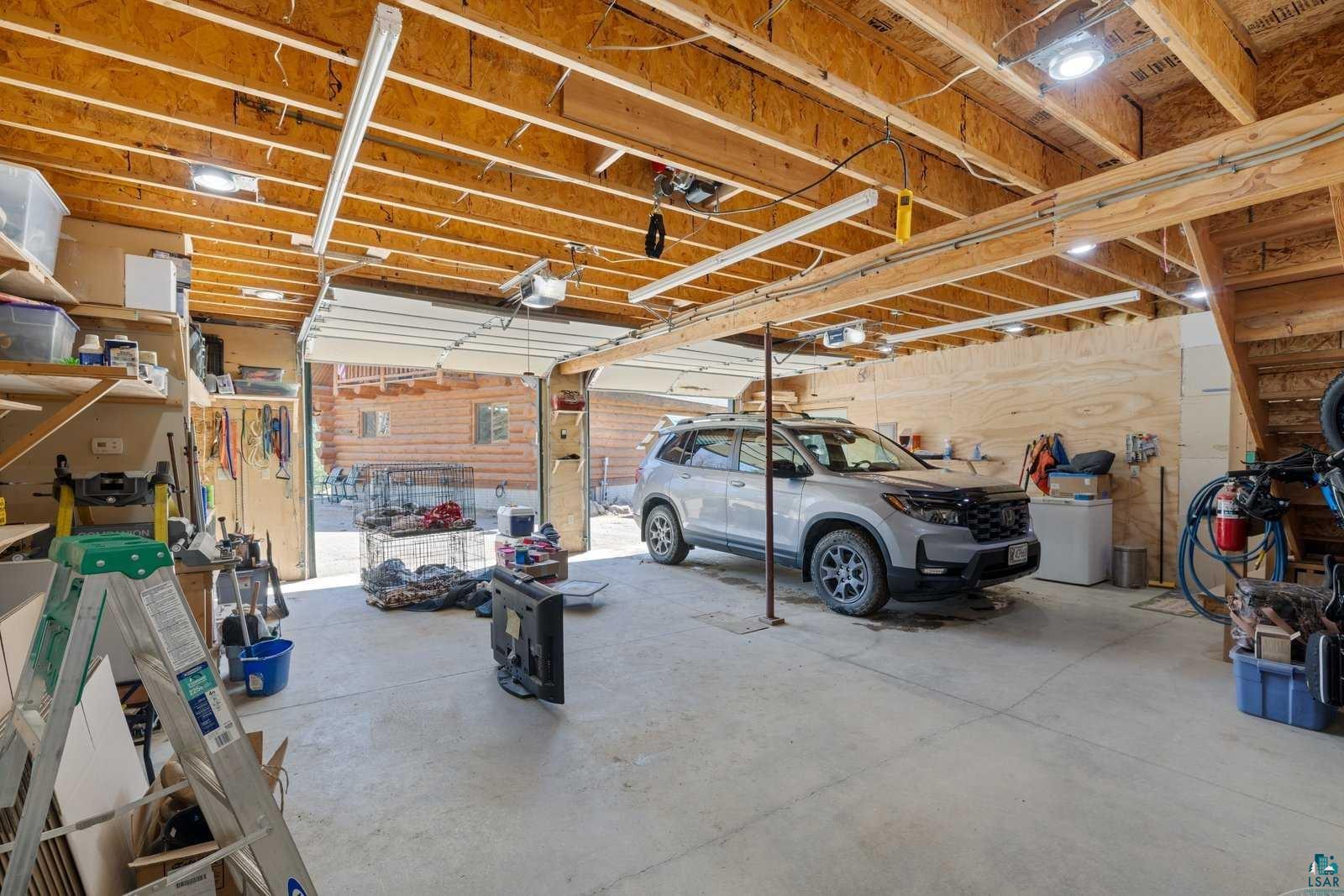 12957 West Ridge Road Ely, MN 55731 - Photo 28 of 41 Garage with a garage door opener