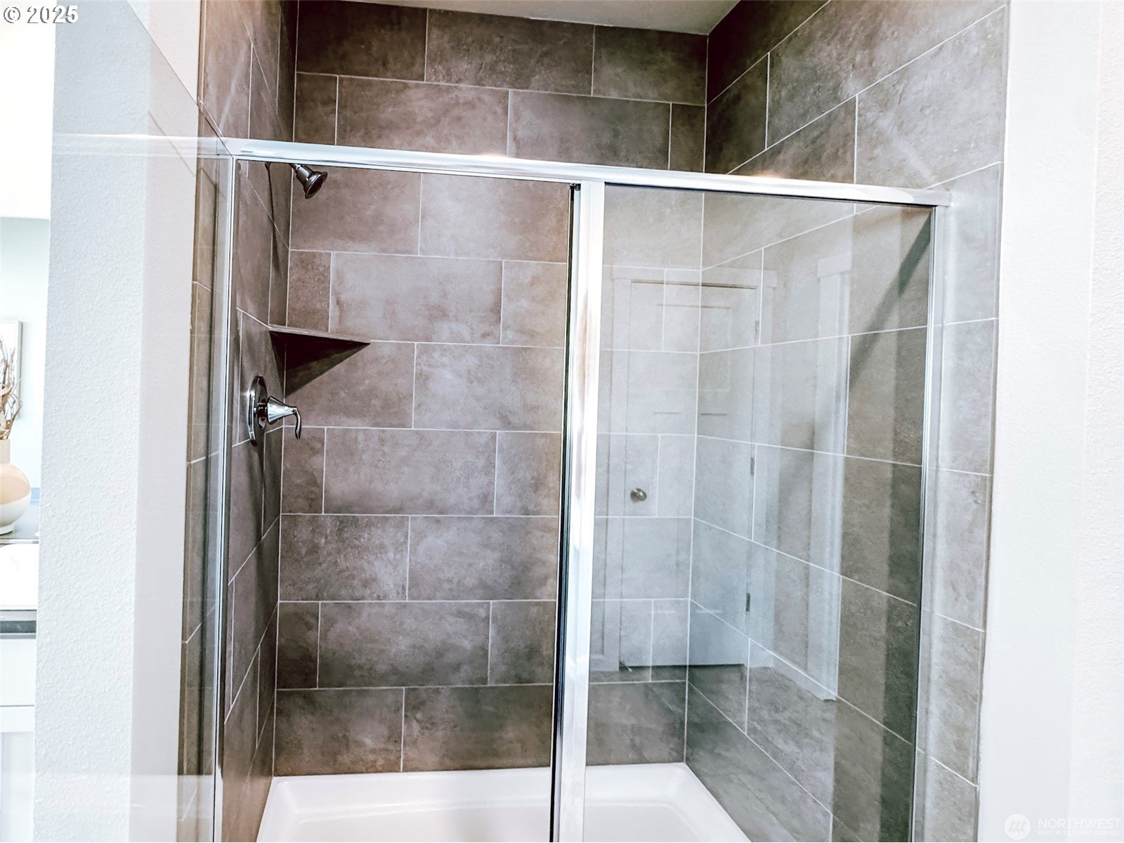 2822 South 9th Avenue Ridgefield, WA 98642 - Photo 17 of 27 a bathroom with a glass shower door