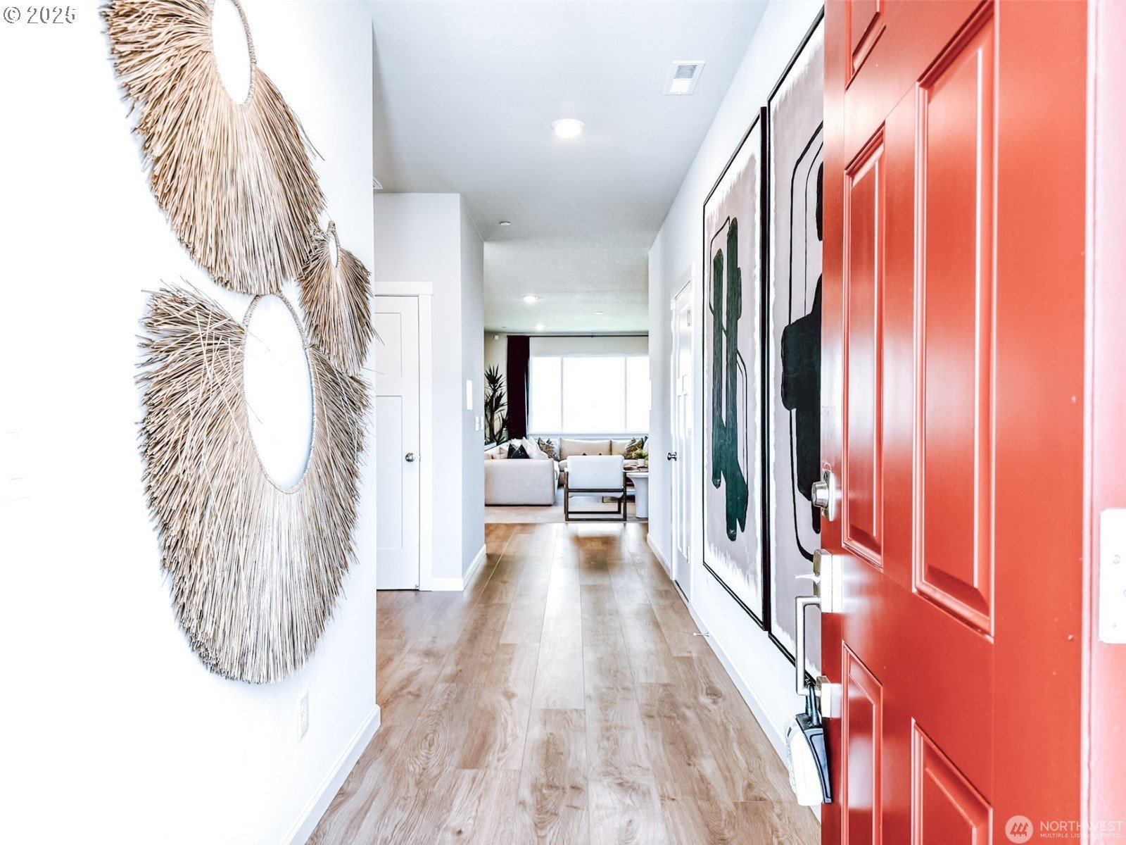 2822 South 9th Avenue Ridgefield, WA 98642 - Photo 2 of 27 a view of hallway with furniture and a chandelier