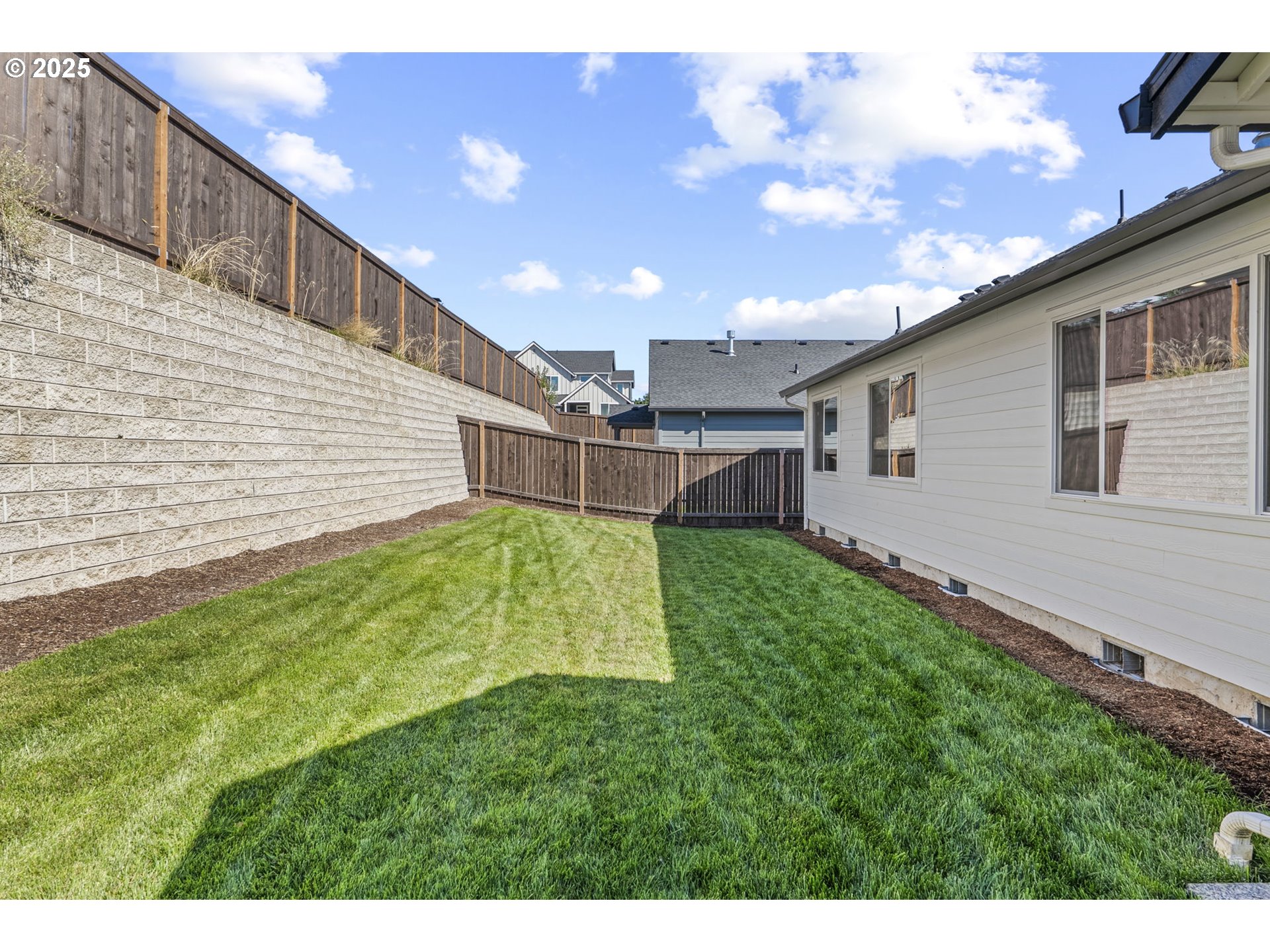 2822 South 9th Avenue Ridgefield, WA 98642 - Photo 22 of 27 a view of a backyard with a garden