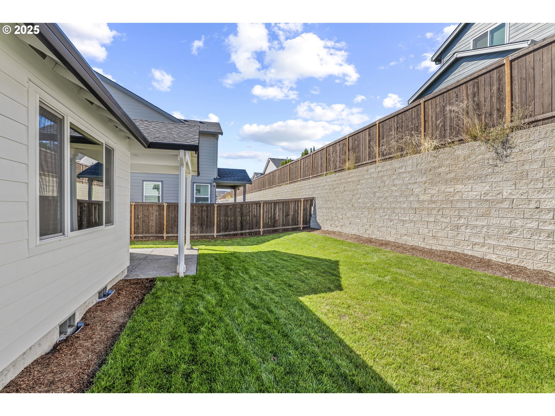 2822 South 9th Avenue Ridgefield, WA 98642 - Photo 25 of 27 a view of an house with backyard porch and entertaining space