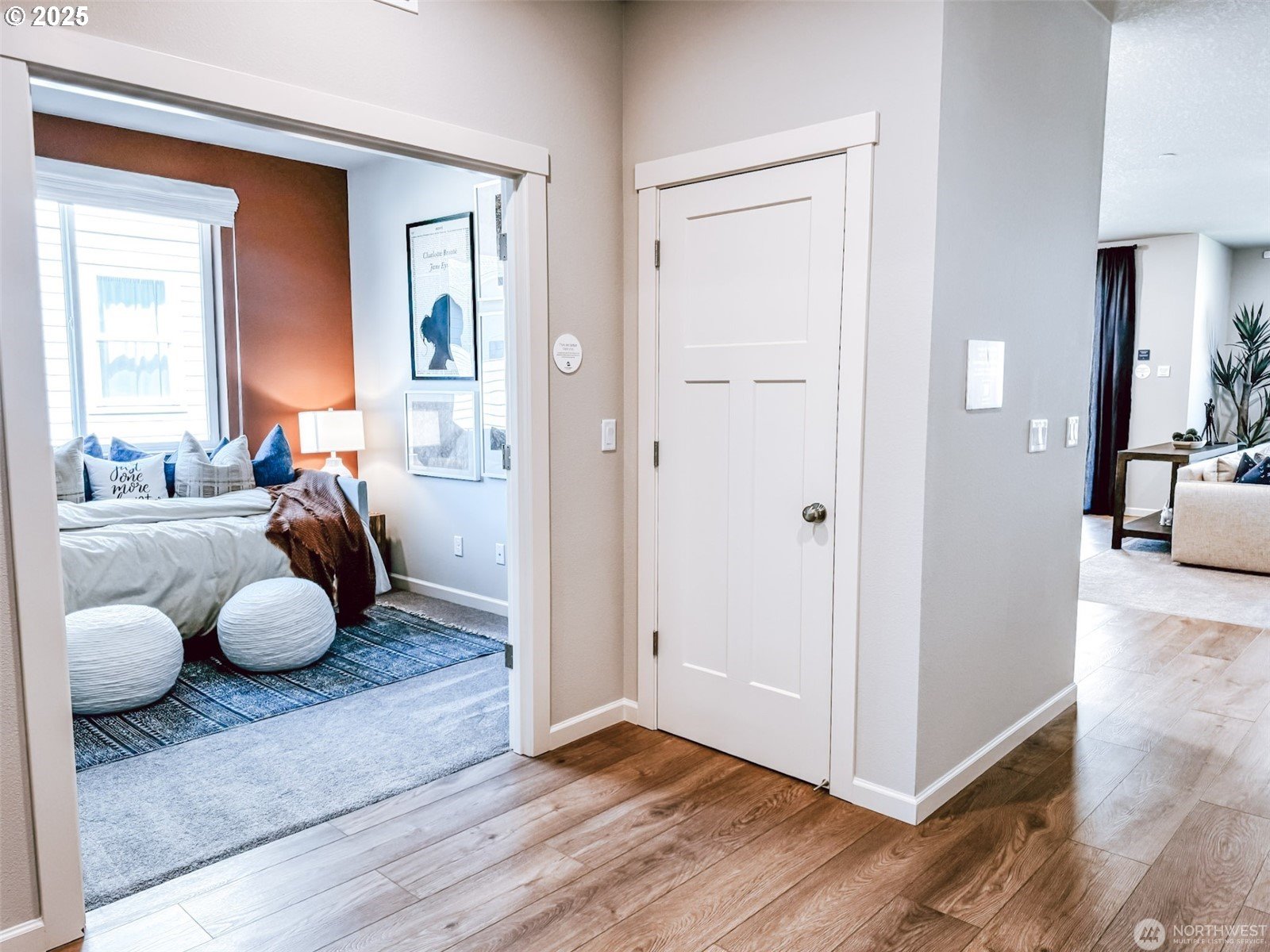 2822 South 9th Avenue Ridgefield, WA 98642 - Photo 4 of 27 a room with wooden floor and a potted plant