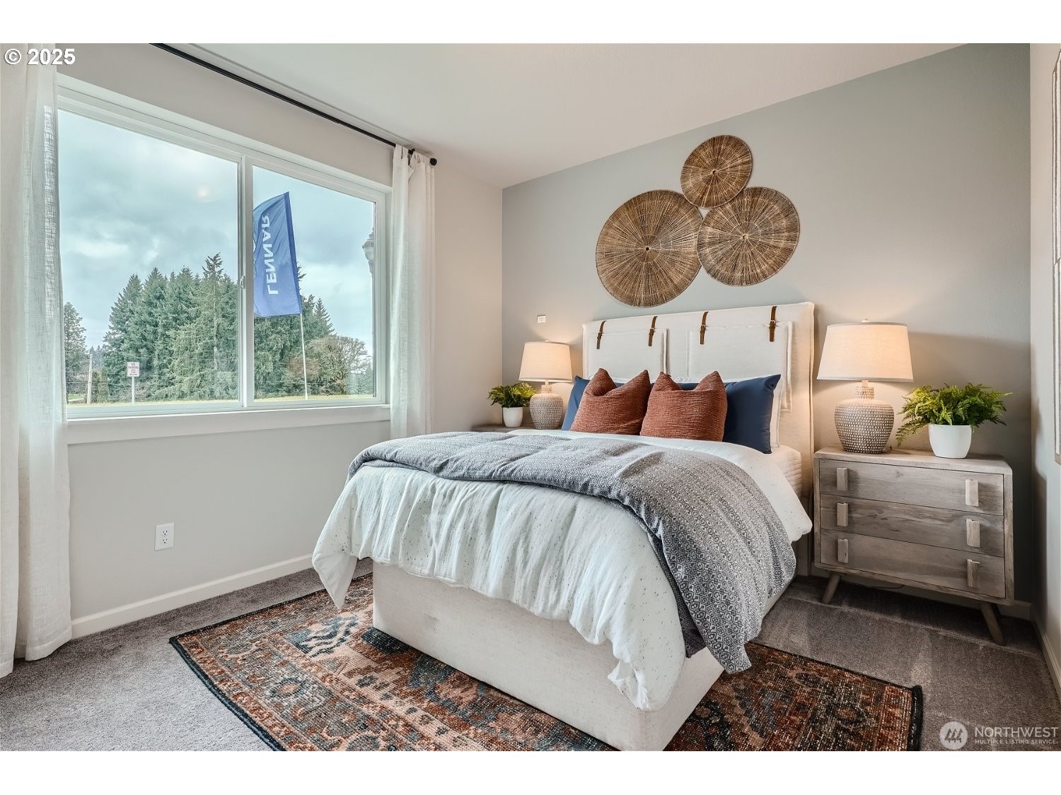 2822 South 9th Avenue Ridgefield, WA 98642 - Photo 8 of 27 a bed sitting in a bedroom next to a window