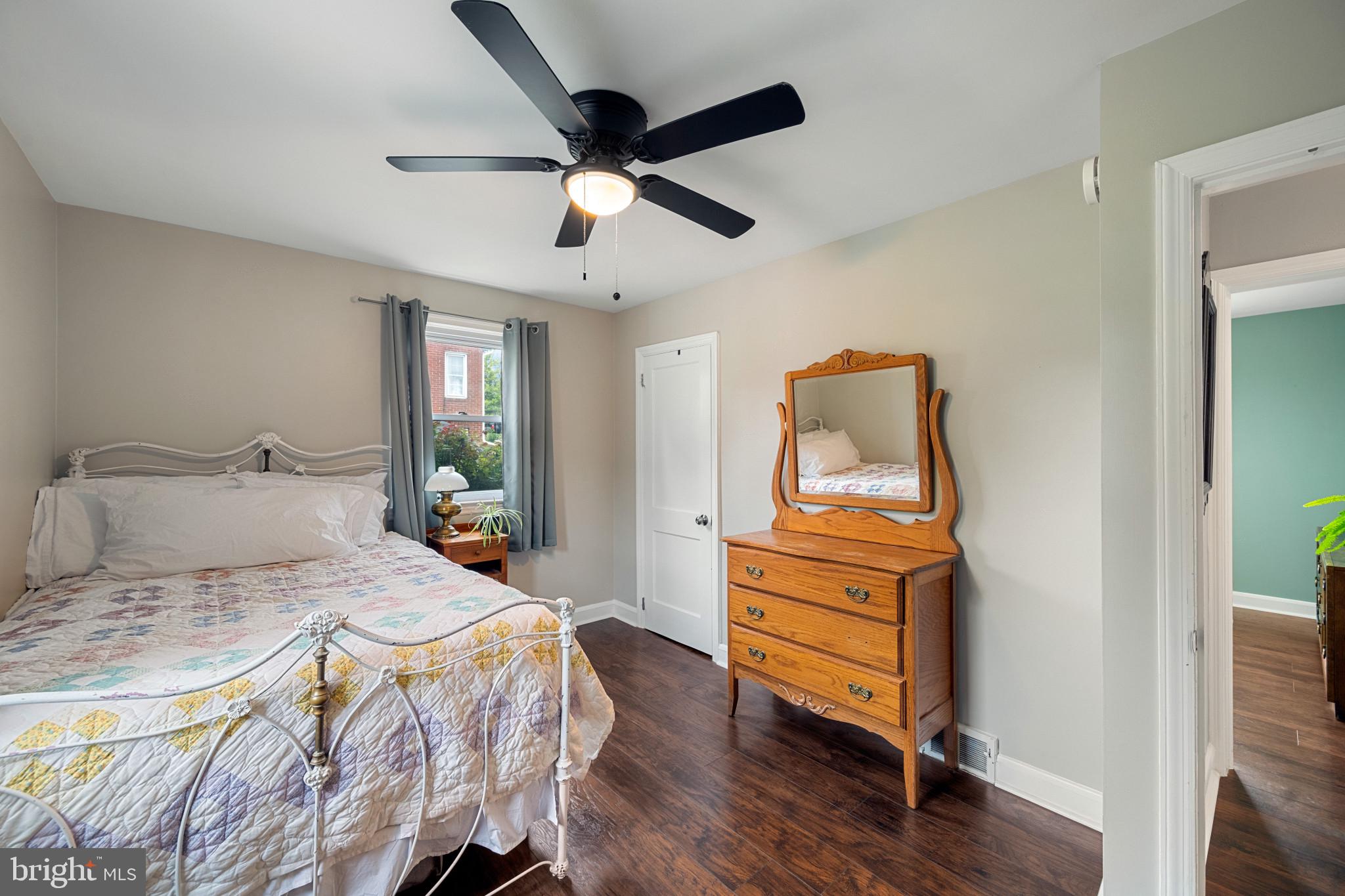 705 Longview Avenue Westminster, MD 21157 - Photo 15 of 30 a bedroom with a bed and wooden floor
