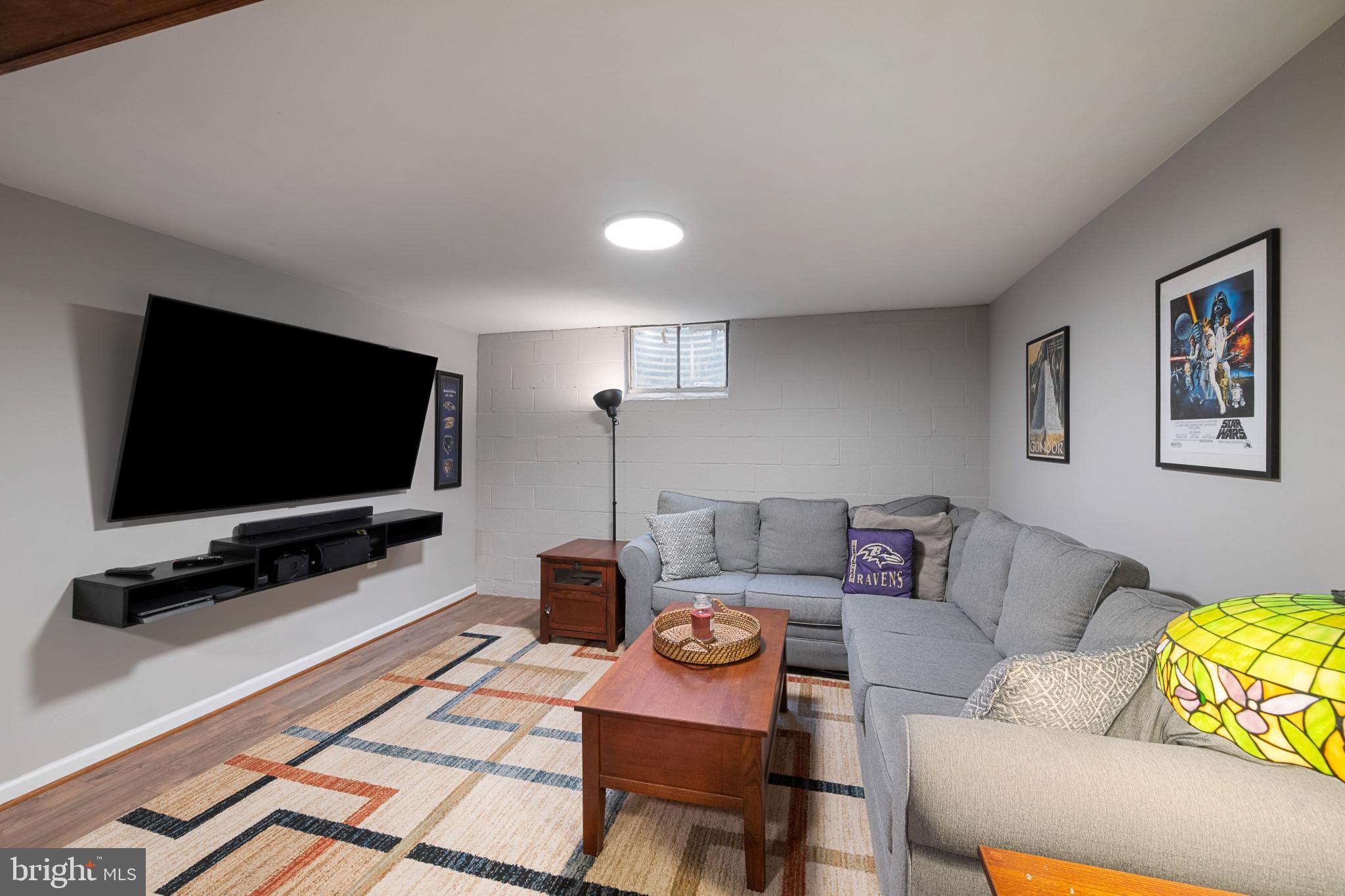 705 Longview Avenue Westminster, MD 21157 - Photo 25 of 30 a living room with furniture and a flat screen tv