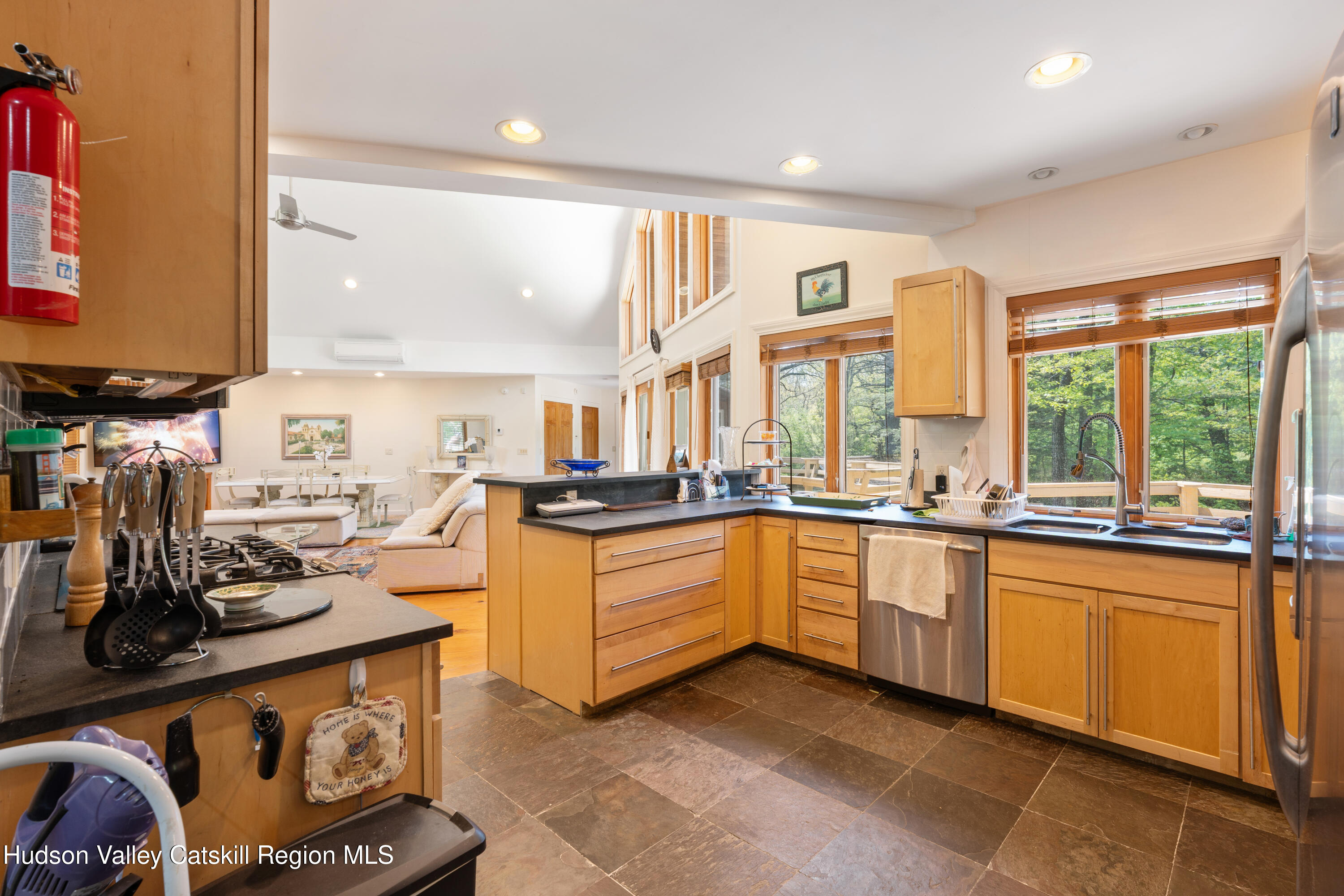 537 Mossy Hill Road Catskill, NY 12414 - Photo 73 of 105 a kitchen with stainless steel appliances granite countertop a stove a sink and a refrigerator