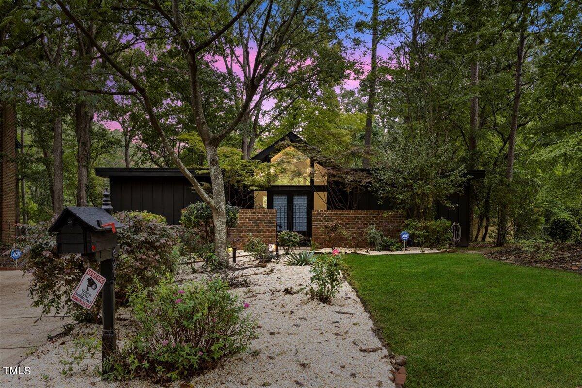 a front view of house with yard