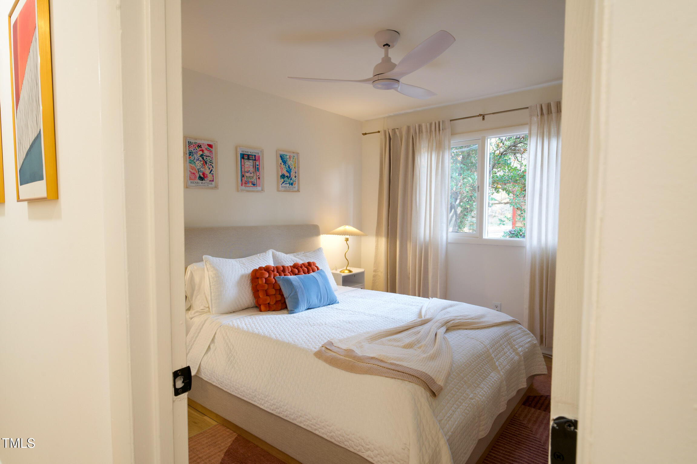 225 Woods Ream Drive Raleigh, NC 27615 - Photo 20 of 45 a bedroom with a bed and a window