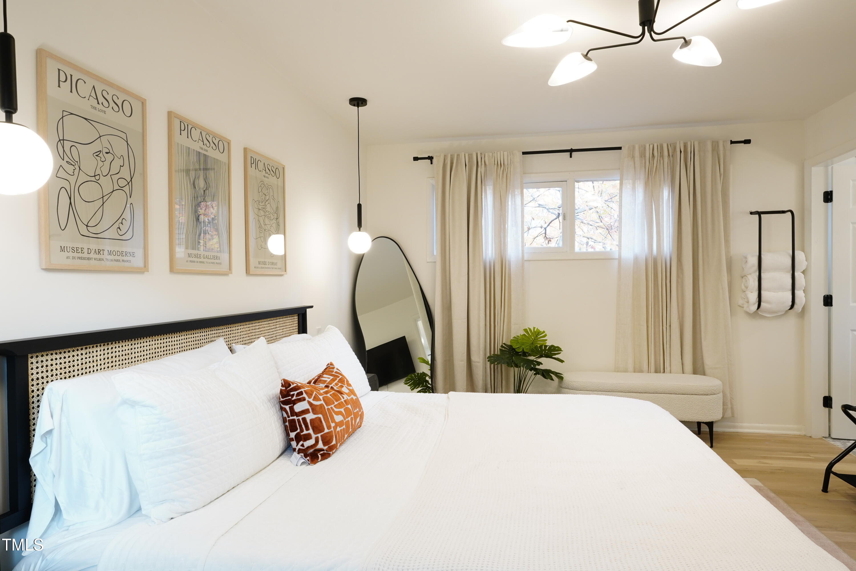 225 Woods Ream Drive Raleigh, NC 27615 - Photo 25 of 45 a bedroom with a bed and window