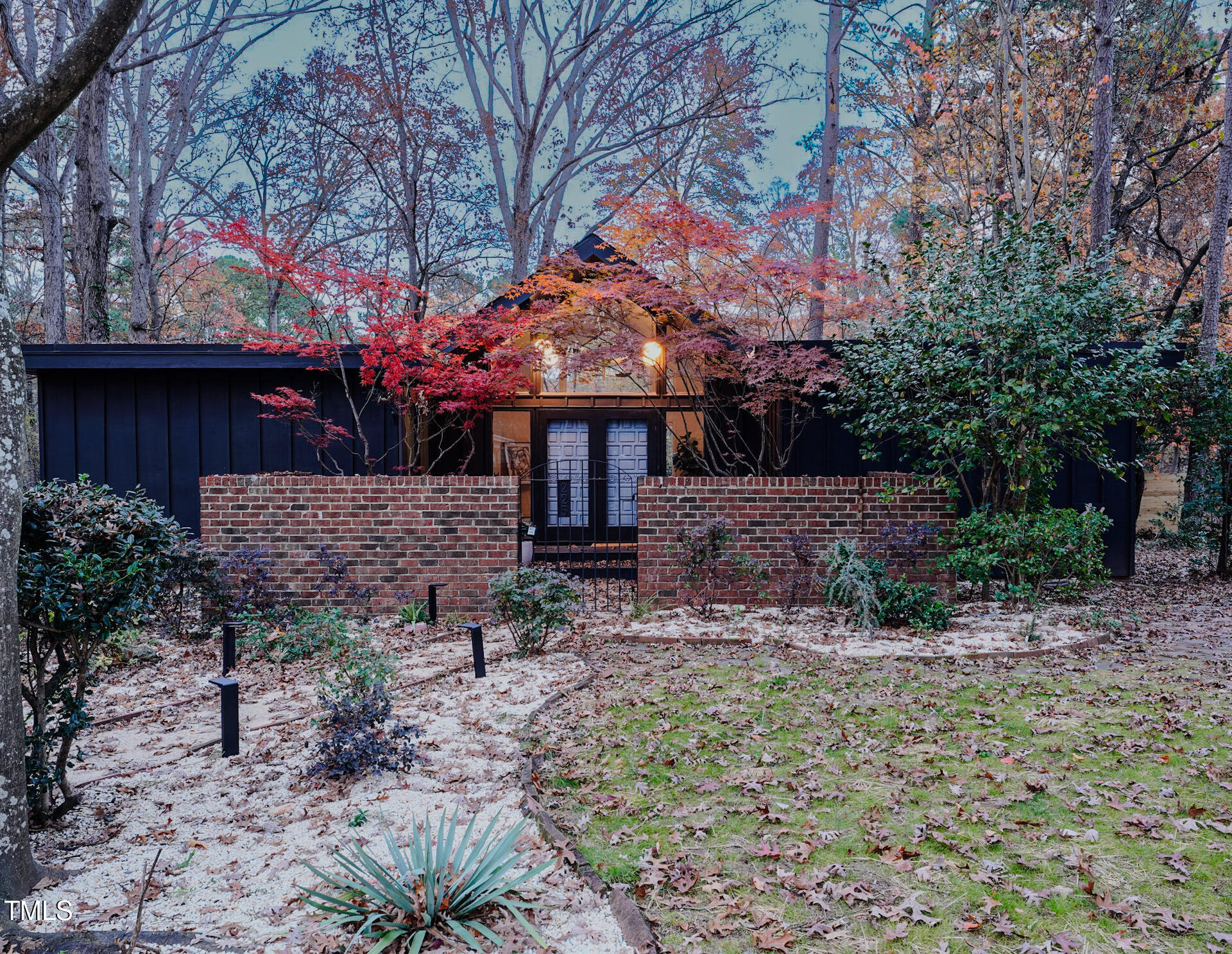 225 Woods Ream Drive Raleigh, NC 27615 - Photo 2 of 45 a front view of a house with a tree