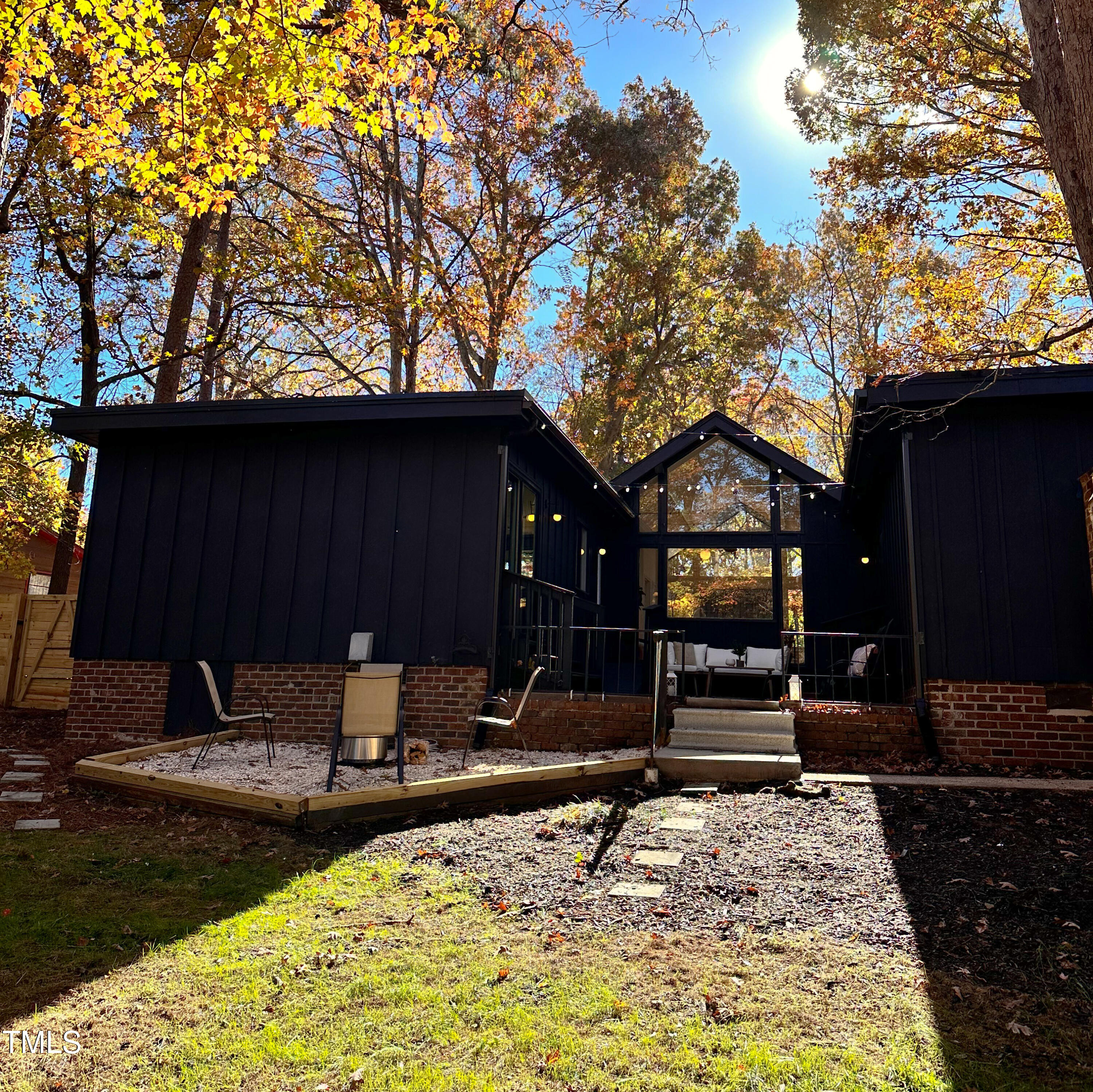 225 Woods Ream Drive Raleigh, NC 27615 - Photo 37 of 45 a backyard of a house with barbeque oven