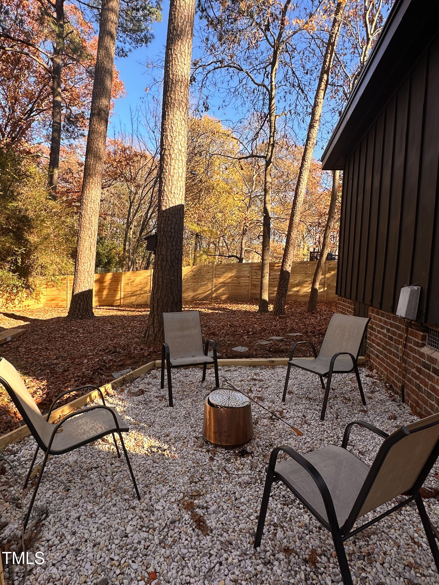 225 Woods Ream Drive Raleigh, NC 27615 - Photo 38 of 45 a view of a backyard with sitting area