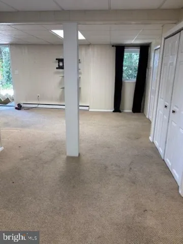 a view of balcony with wooden floor