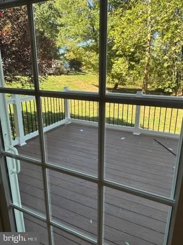 a view of deck and wooden floor