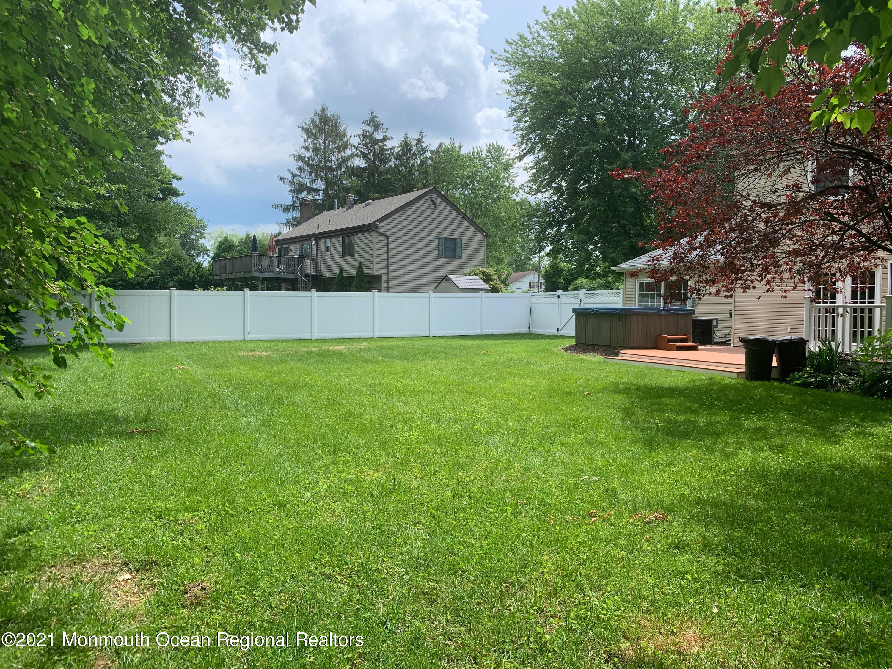 66 Andover Road Jackson, NJ 08527 - Photo 22 of 25 a view of a house with a yard and sitting area