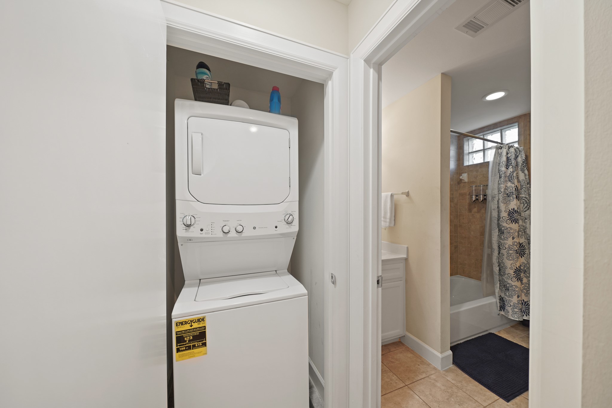 8705 Bryam Street, Unit 104 Houston, TX 77061 - Photo 15 of 16 The laundry area offers a tucked-away washer/dryer closet with easy access from the main living space.