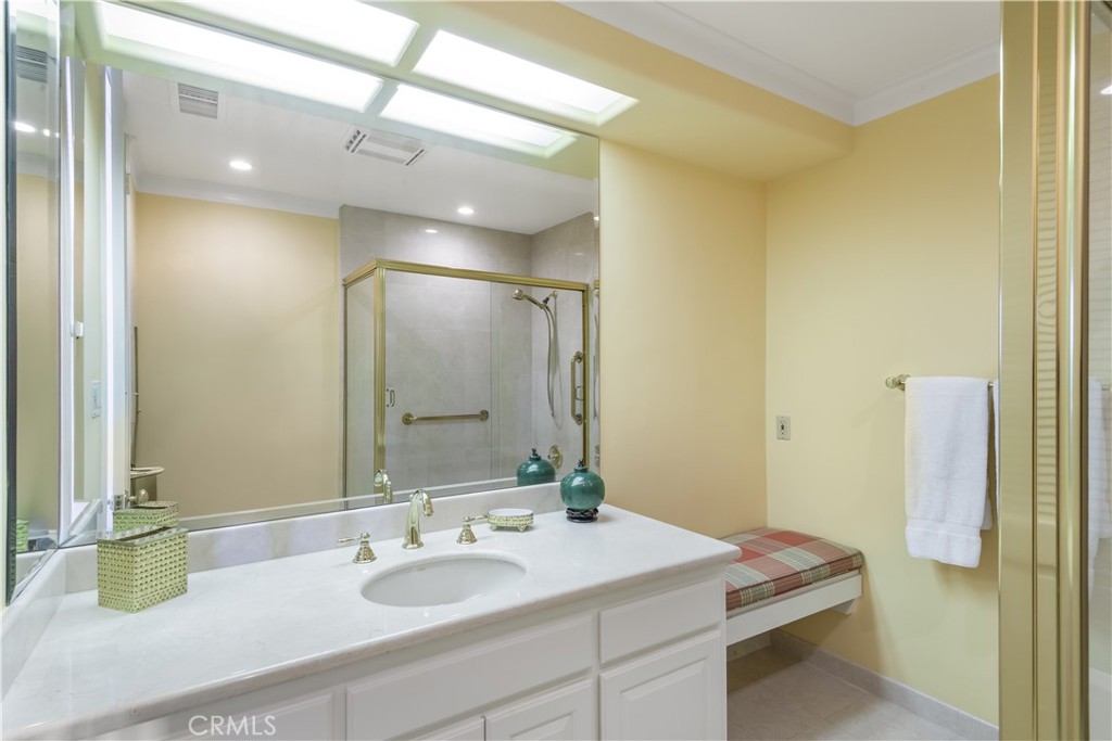 34 Crest Rolling Hills Palos Verdes Peninsula, CA 90274 - Photo 21 of 35 a bathroom with a granite countertop sink and a mirror