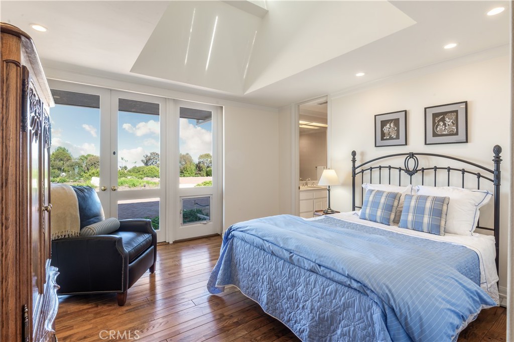 34 Crest Rolling Hills Palos Verdes Peninsula, CA 90274 - Photo 24 of 35 a bedroom with a bed couch and a window