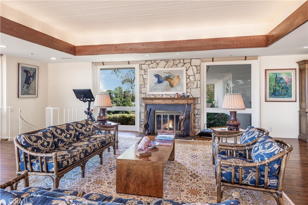 34 Crest Rolling Hills Palos Verdes Peninsula, CA 90274 - Photo 28 of 35 a living room with furniture and a fireplace