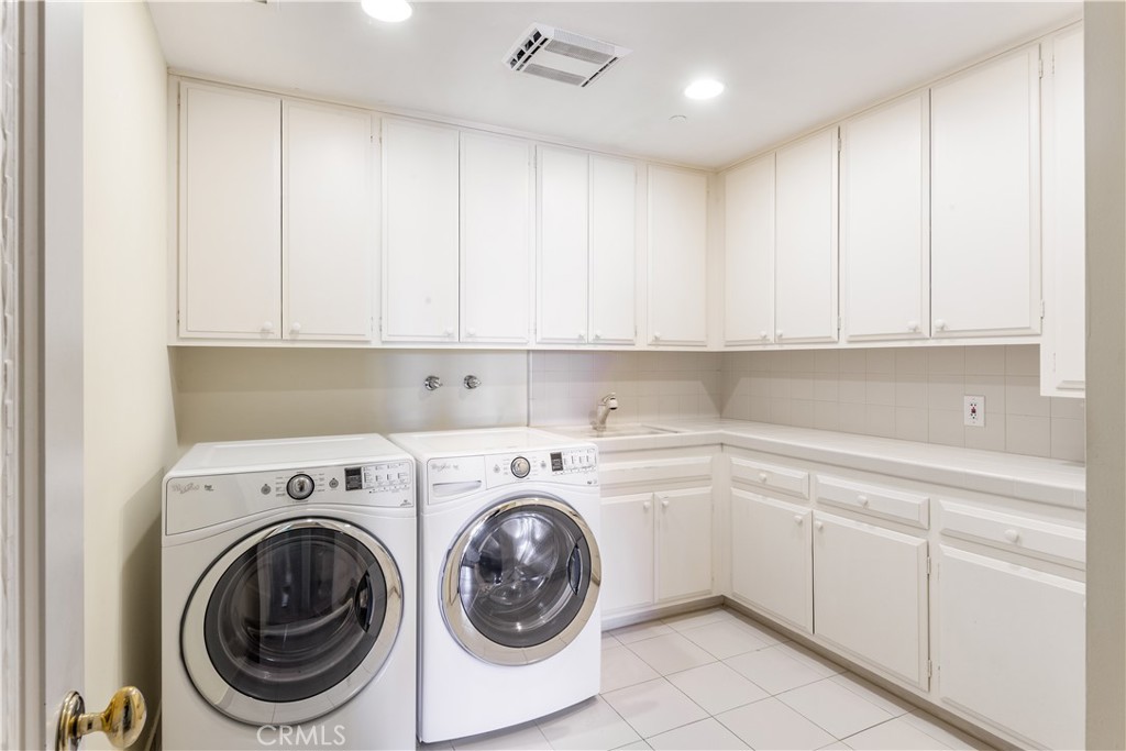 34 Crest Rolling Hills Palos Verdes Peninsula, CA 90274 - Photo 29 of 35 a utility room with sink dryer and washer