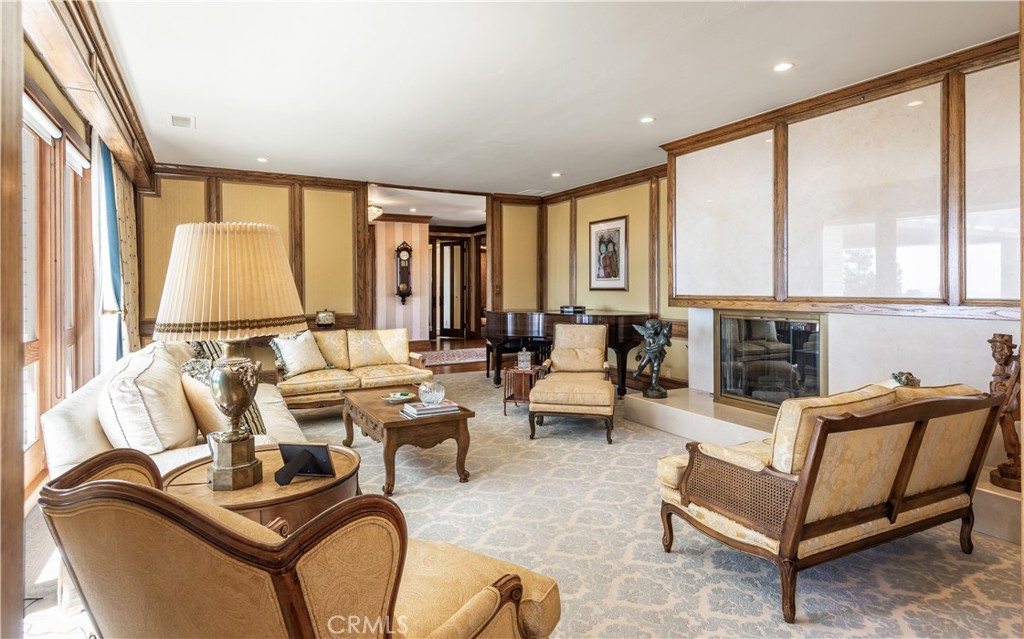 34 Crest Rolling Hills Palos Verdes Peninsula, CA 90274 - Photo 30 of 35 a living room with furniture and large windows