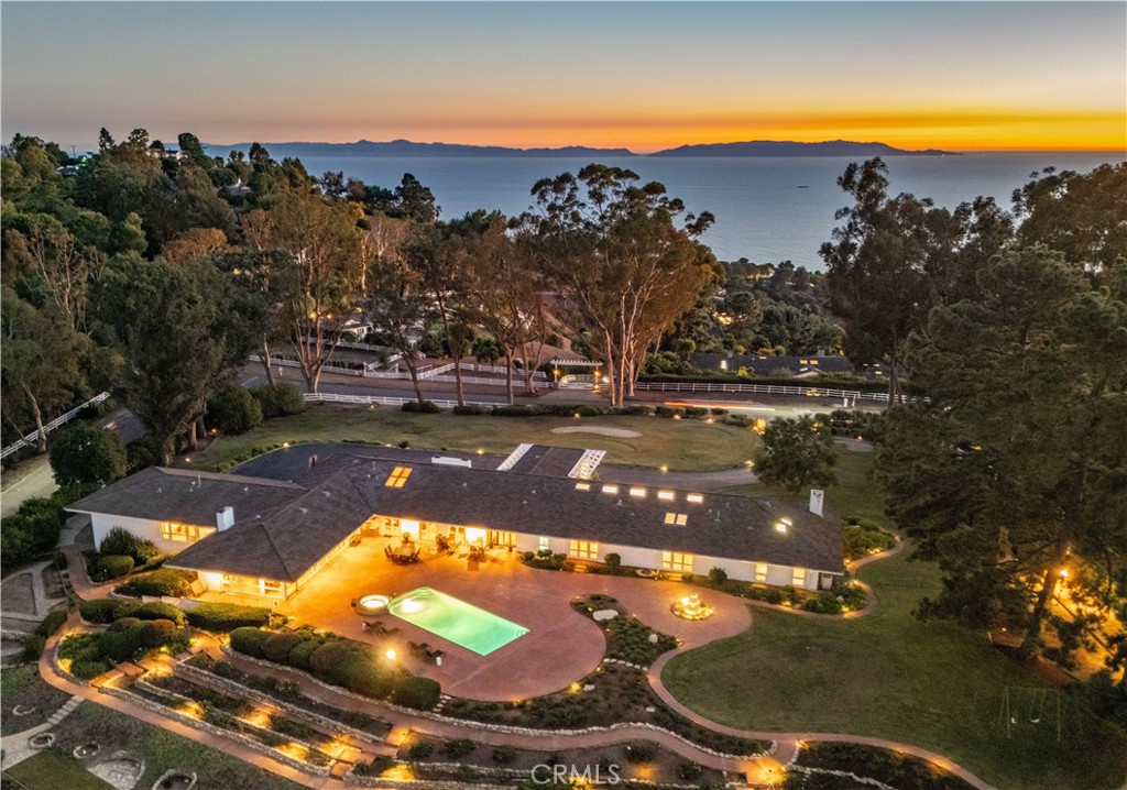 34 Crest Rolling Hills Palos Verdes Peninsula, CA 90274 - Photo 34 of 35 a view of a swimming pool with an outdoor space and seating area
