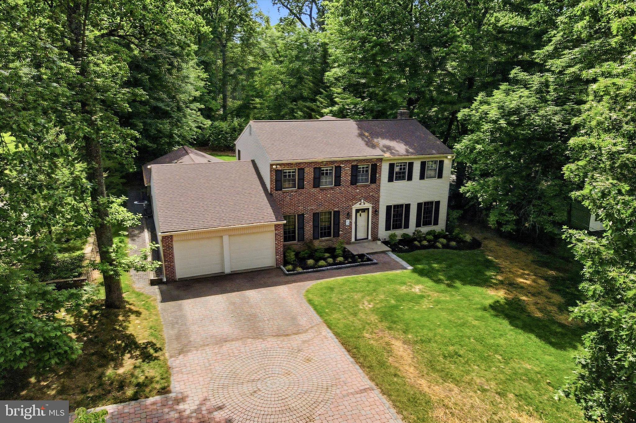 1980 Terwood Road Huntingdon Valley, PA 19006 - Photo 41 of 48 a view of a house with backyard sitting area and garden