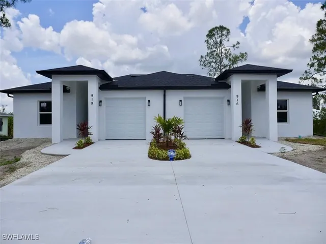 a house view with a garden space