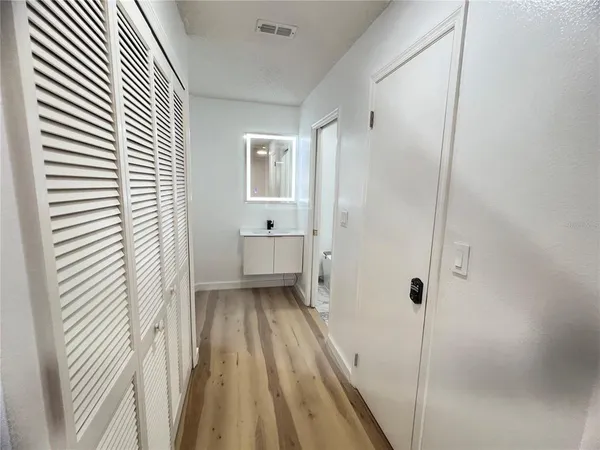 a bathroom with a sink and a shower