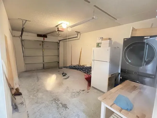 a view of a storage & utility room with a sink
