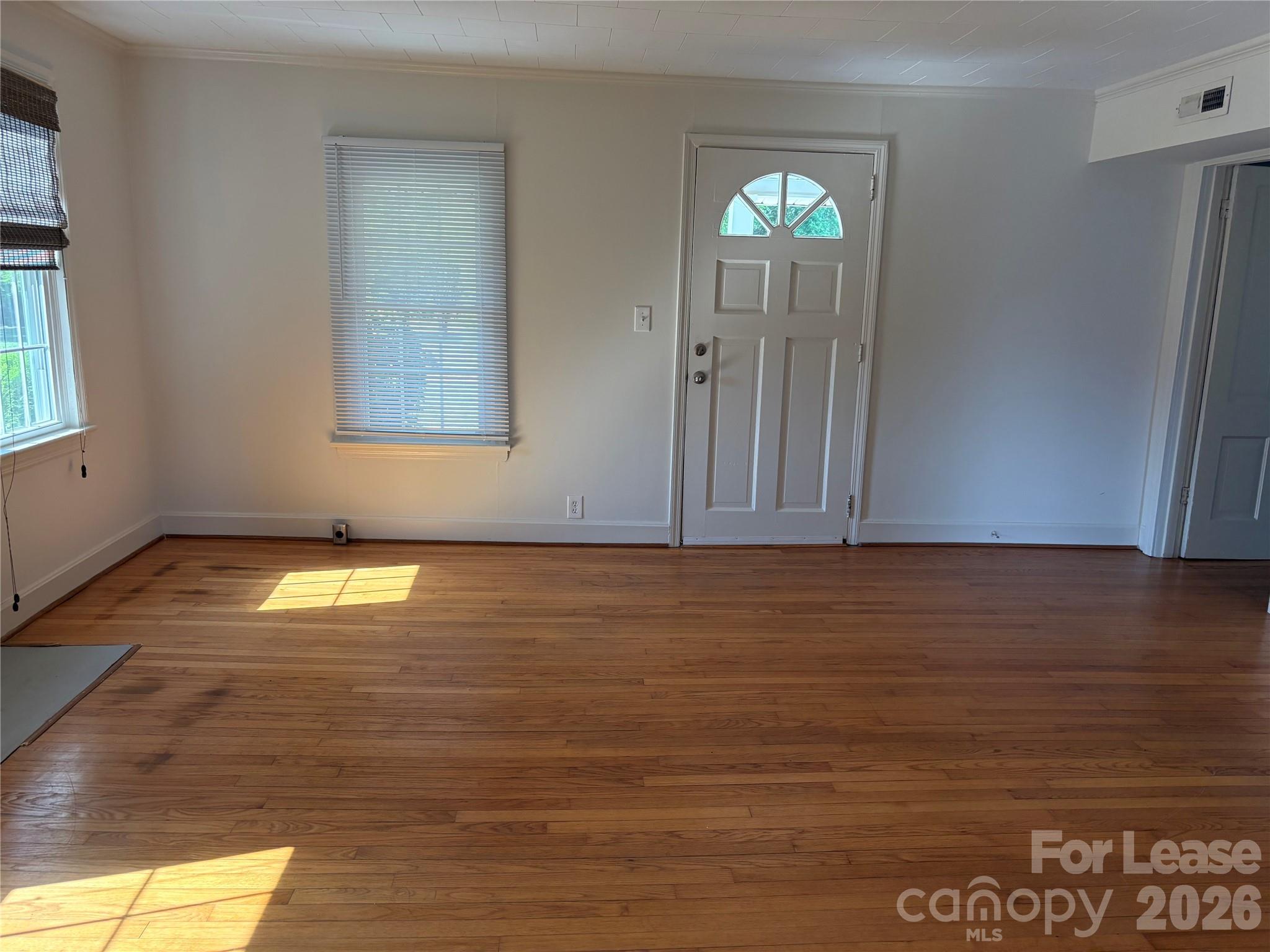 6625 Long Road Matthews, NC 28104 - Photo 5 of 21 a view of empty room with window