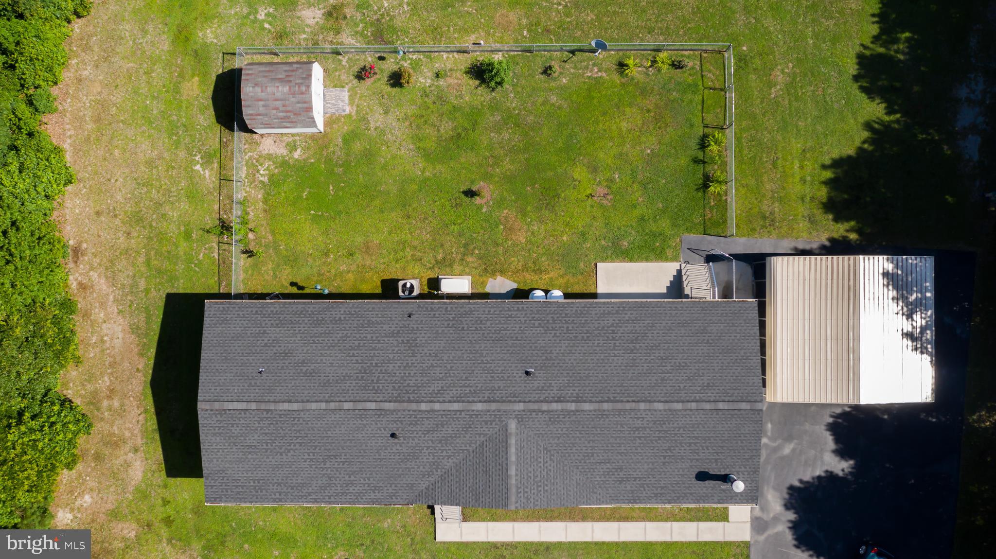 4769 Rabbit Run Road Bridgeville, DE 19933 - Photo 12 of 46 Aerial view of house and fenced yard