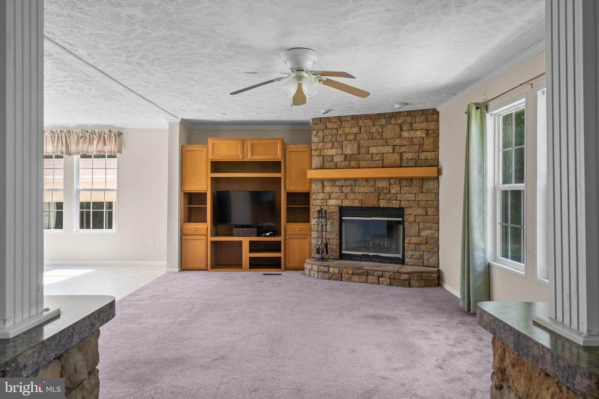 4769 Rabbit Run Road Bridgeville, DE 19933 - Photo 16 of 46 Second living room with fireplace