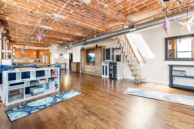 a view of livingroom with furniture and wooden floor