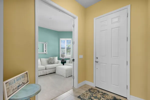 a living room with furniture and a gate