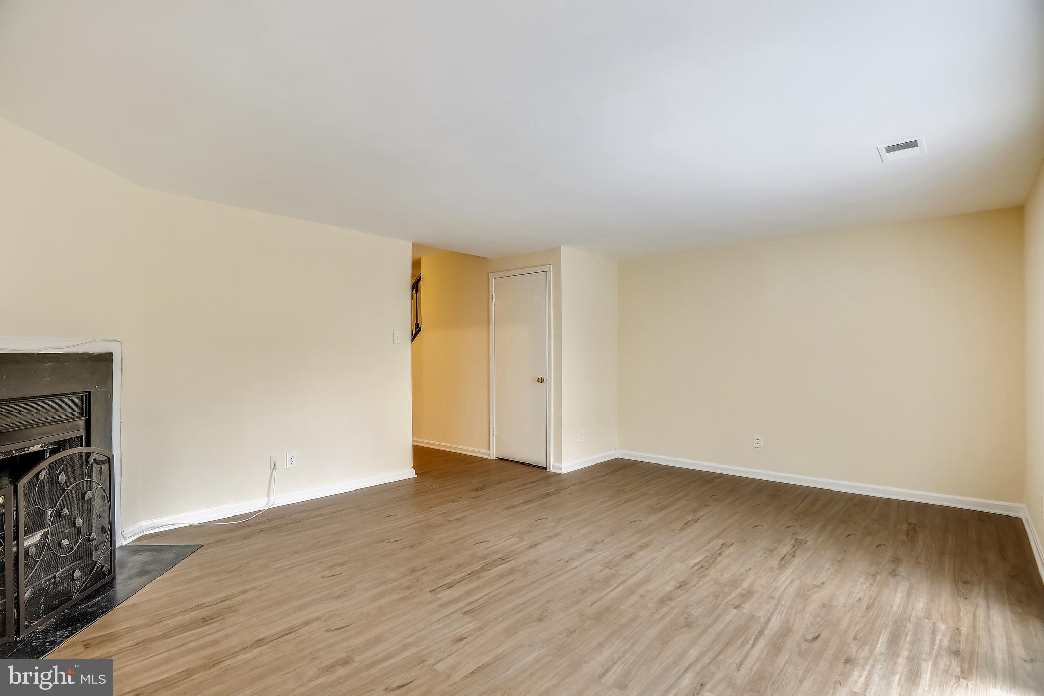 10600 Georgia Avenue Silver Spring, MD 20902 - Photo 31 of 44 Lower level rec-room (fireplace decorative only)