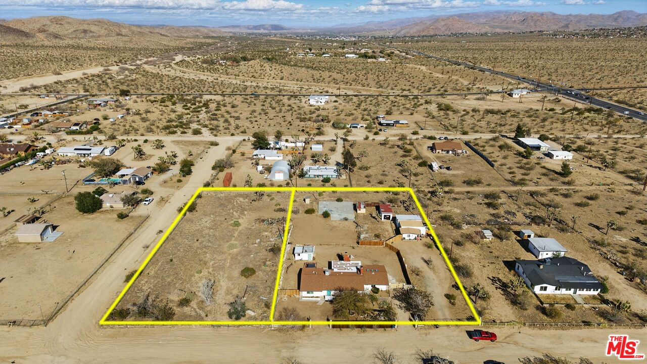 6391 Ruth Drive Yucca Valley, CA 92284 - Photo 11 of 56 an aerial view of residential houses with outdoor space