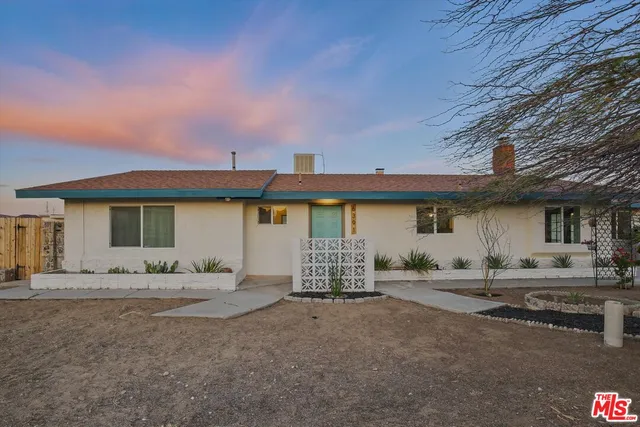a view of a house with patio
