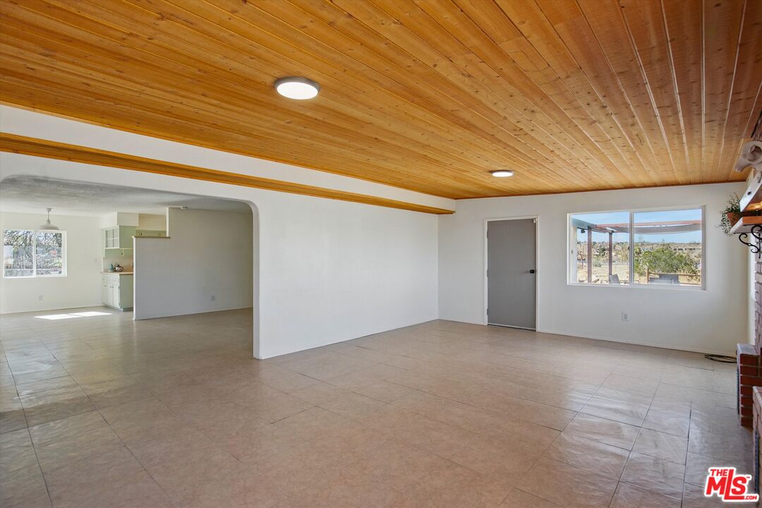 6391 Ruth Drive Yucca Valley, CA 92284 - Photo 22 of 56 an empty room with windows
